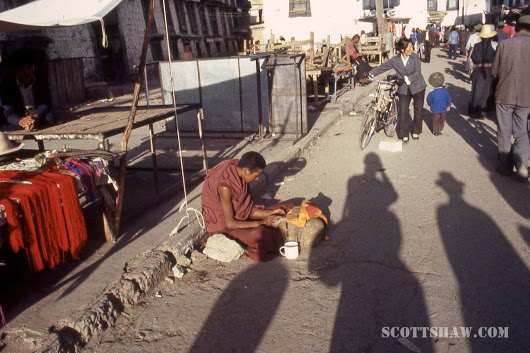  Lhasa, Tibet. That's my shadow taking a photograph in the center circa 1986. :-)  
