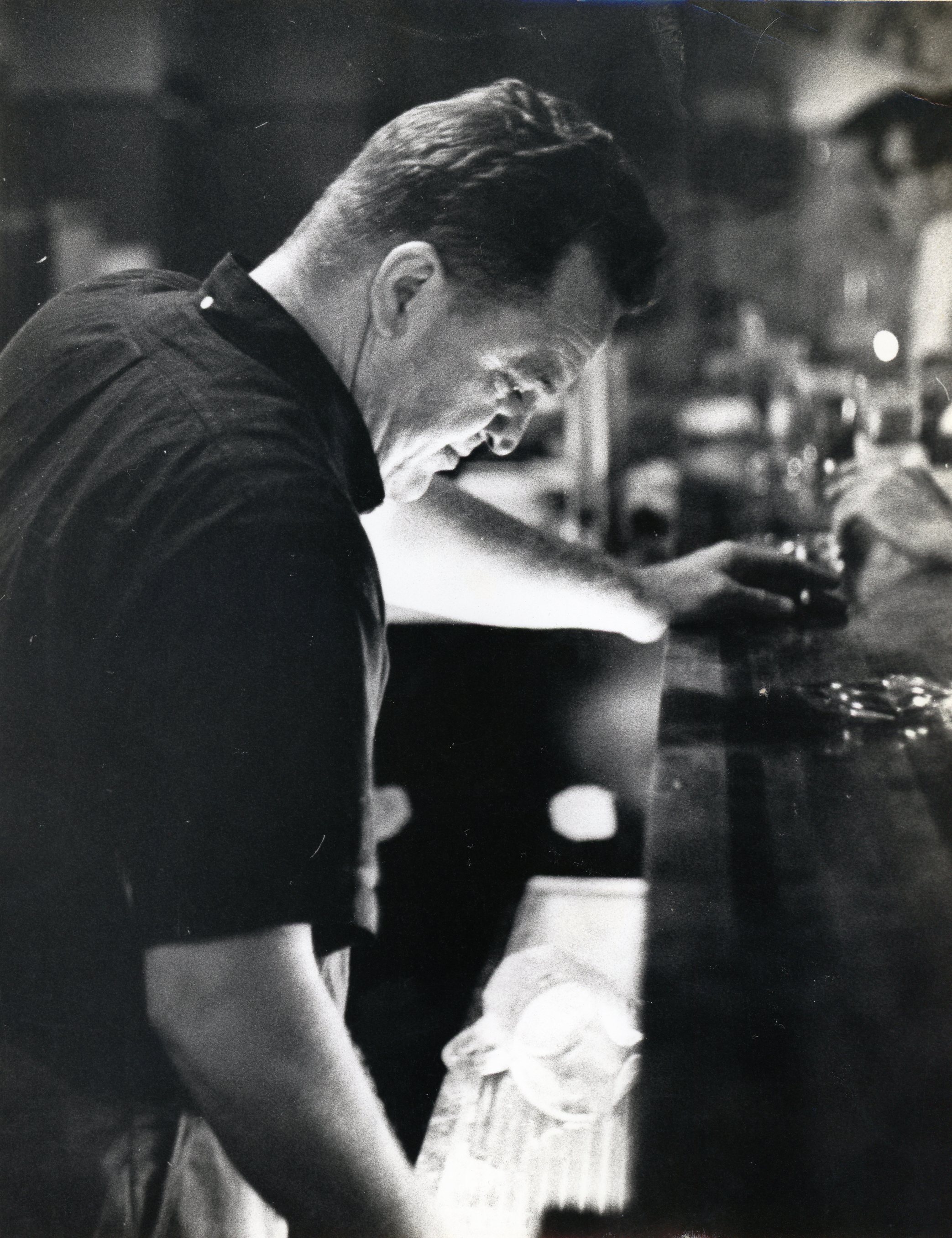  Here's a photo of my father circa late 50s early 60s behind the bar at the restaurant he owned. He used to love to hang out behind the bar and talk to the customers. 