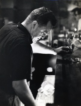  Here's a photo of my father circa late 50s early 60s behind the bar at the restaurant he owned. He used to love to hang out behind the bar and talk to the customers. 