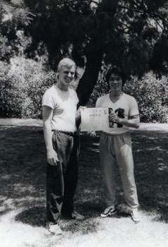  Here I am in the early 1980s with Bruce Lee friend and Yip Man Senior Student, William Cheung. Though my primary focus is obviously on the Korean martial arts, I did also dabble in Wing Chun. Here I am receiving my certificate. 